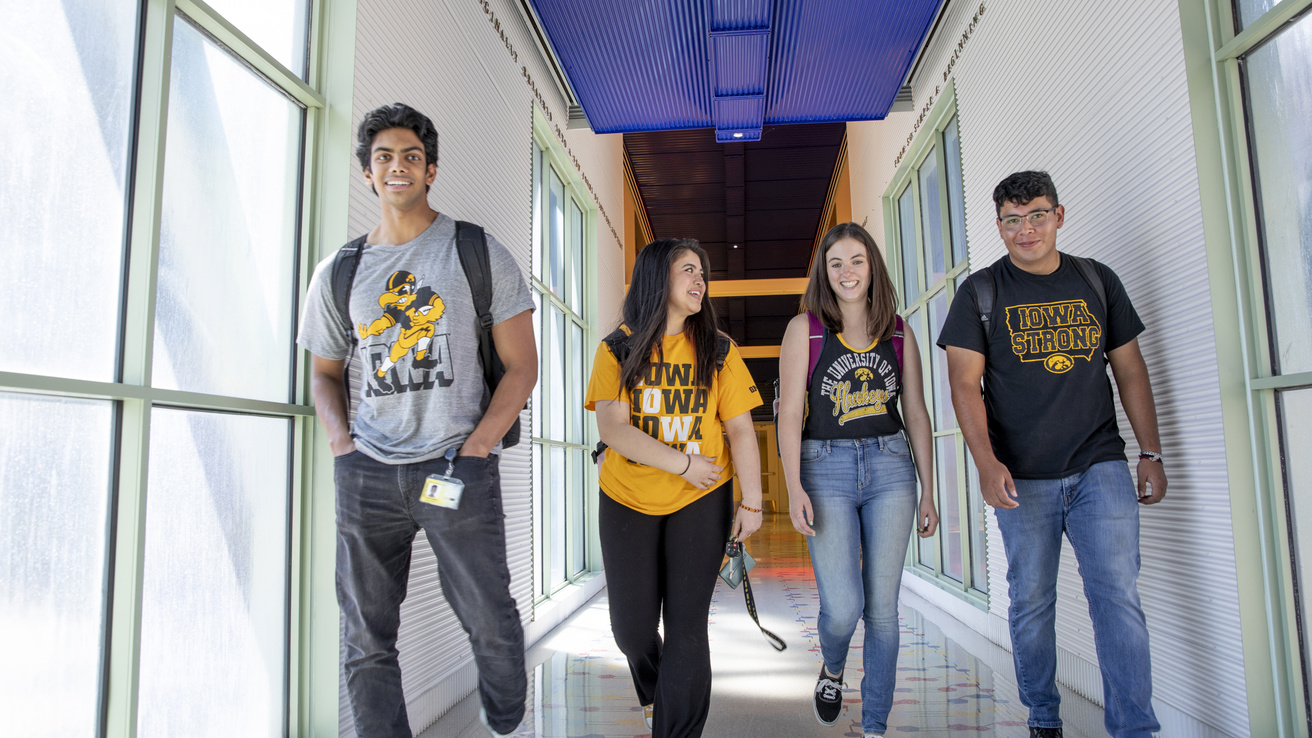 students walking down hallway in Biology building