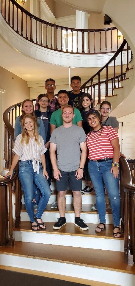 Picture of the 2019 REU cohort at the Old Capital Building